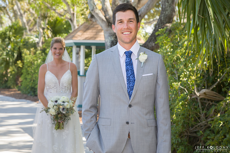 This groom is all smiles seconds before seeing this bride.