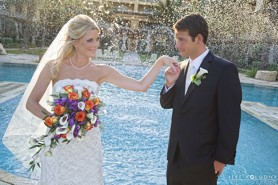 Bride and Groom Posing for a romantic picture at the Eau, Palm Beach
