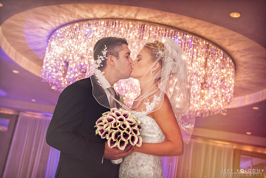 Bride and Groom share a kiss at the Ritz-Carlton Fort Lauderdale. This Broward County wedding venue is on of South Florida's most beautiful hotels.